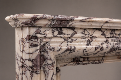 Malva breccia viola marble fireplace mantel by 1-OPH, surface detail