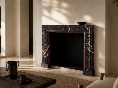 Amaranta plum marble fireplace mantel by 1-OPH, carved detail
