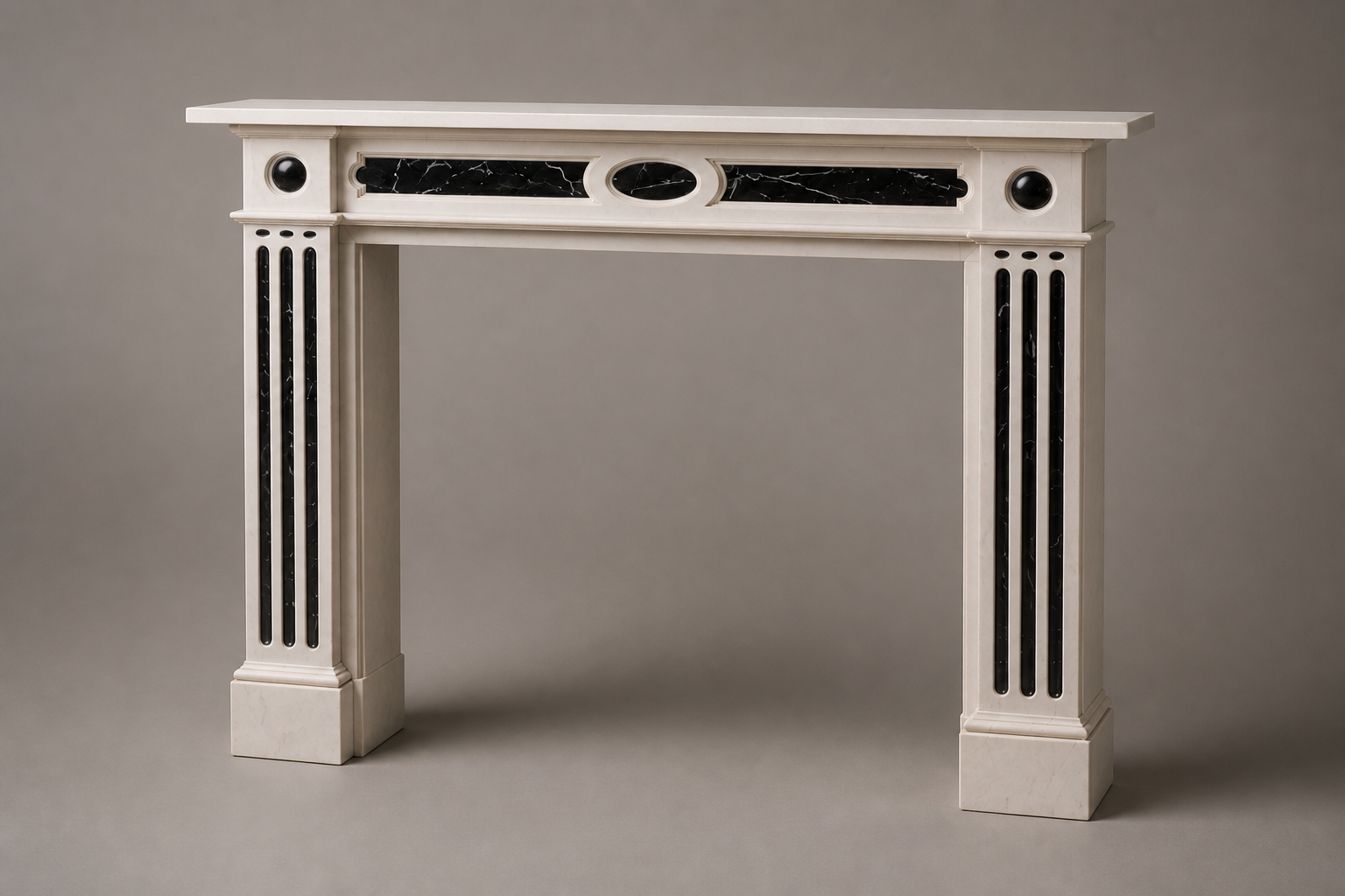 Vetta pale marble with black inlay fireplace mantel by 1-OPH, studio view