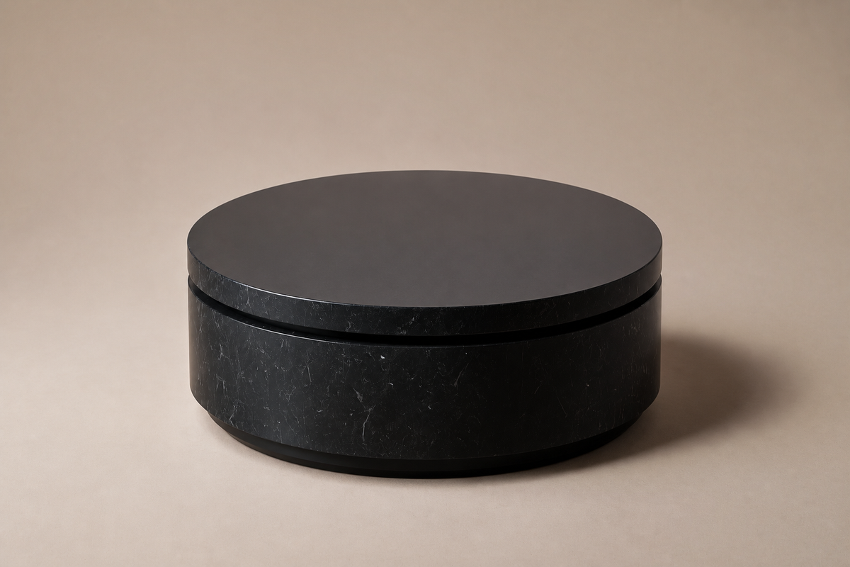 Circular Shadow-Gap Base Low black marble plinth base by 1-OPH, three-quarter studio view