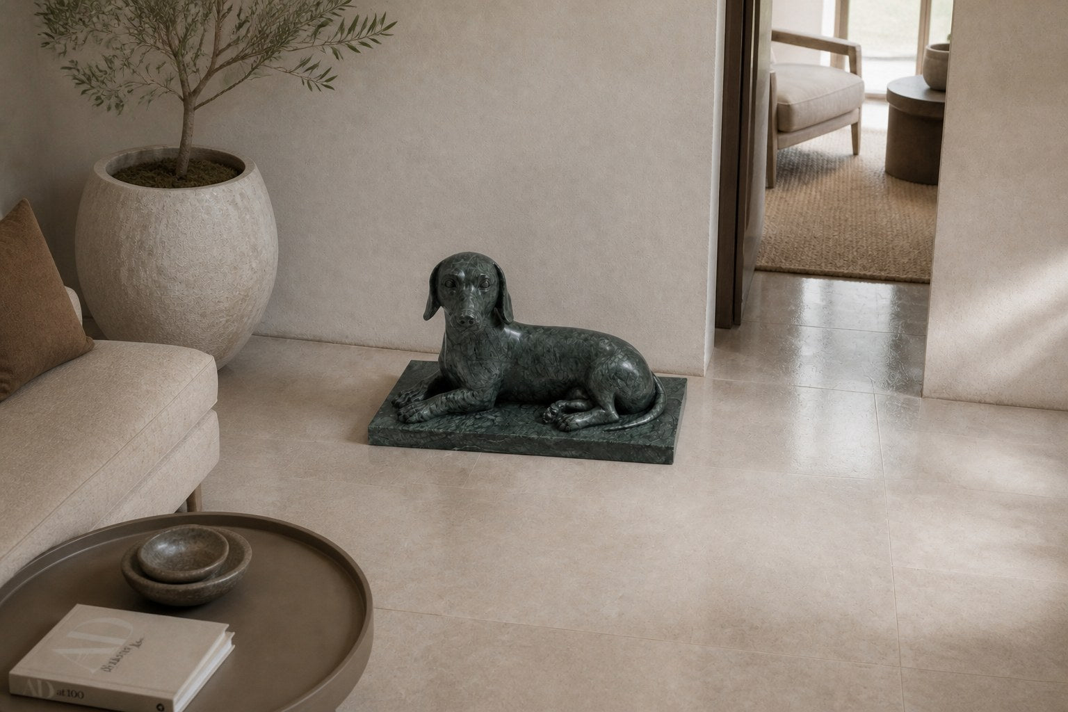 Deep green marble sculpture Collado, a reclining figure carved with its slab base from one block of veined green stone.