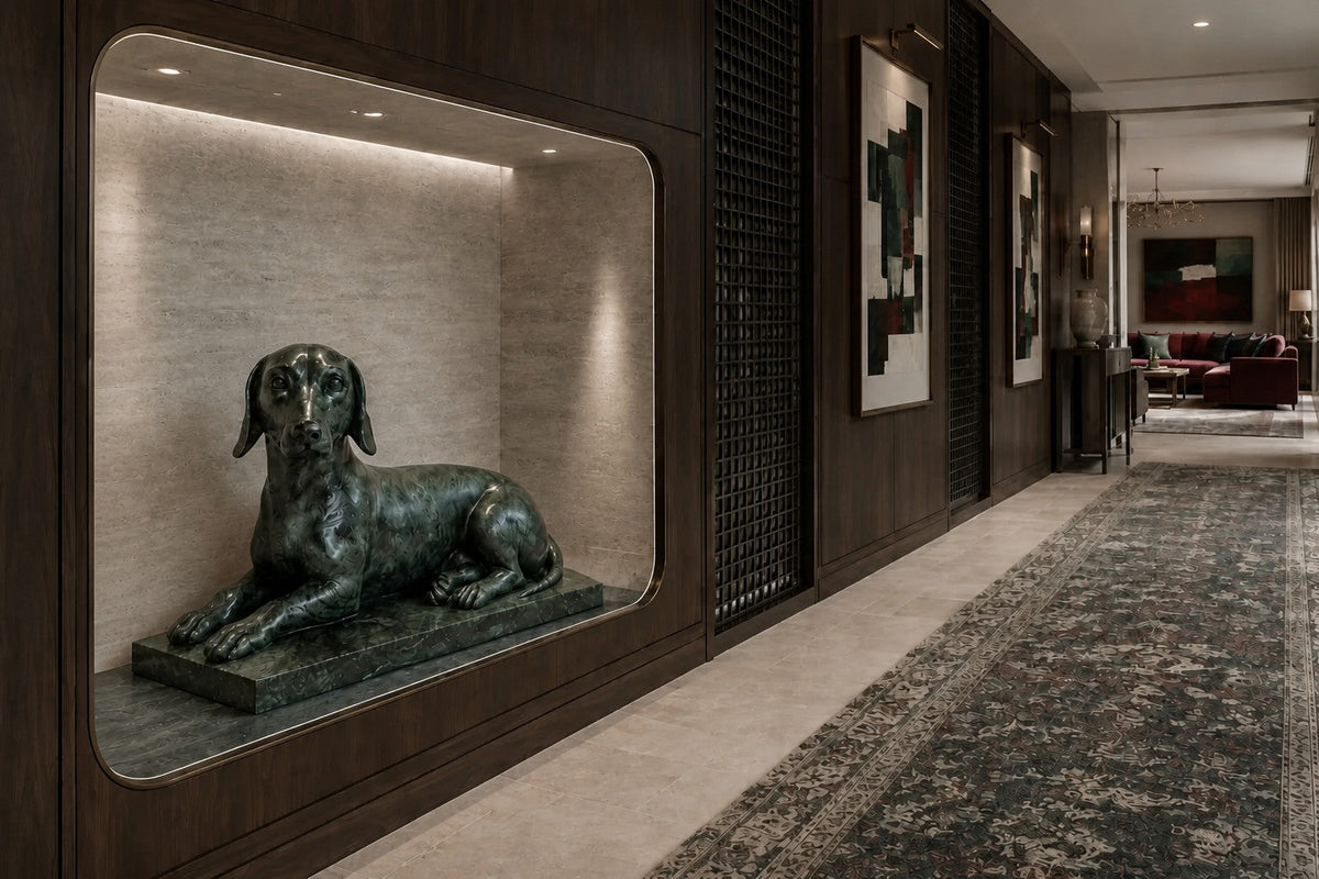 Deep green marble sculpture Collado, a reclining figure carved with its slab base from one block of veined green stone.
