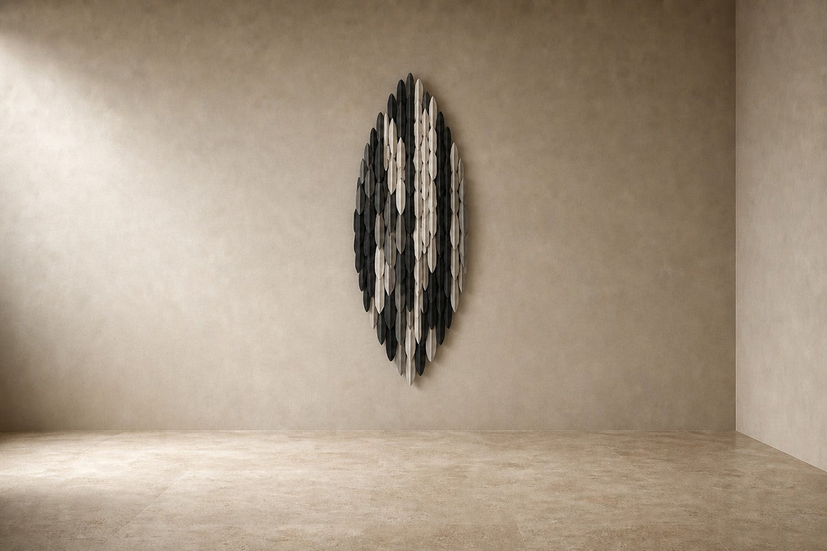 Cumulo — 85 × 150 cm tall oval wall sculpture of black, gold and white plates, studio view of the whole piece