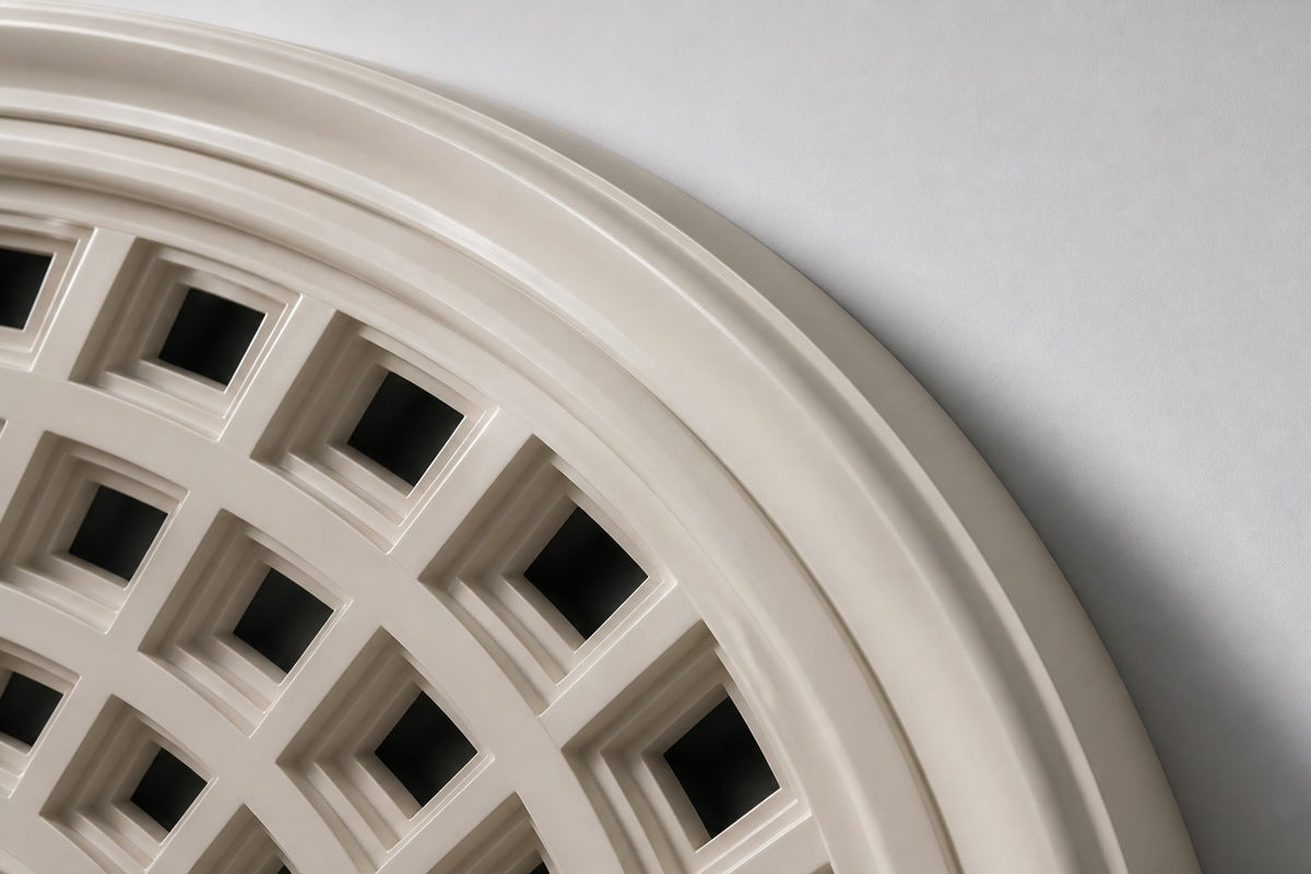 Cupola — ivory oval wall relief of a coffered dome, close detail of the surface and edge