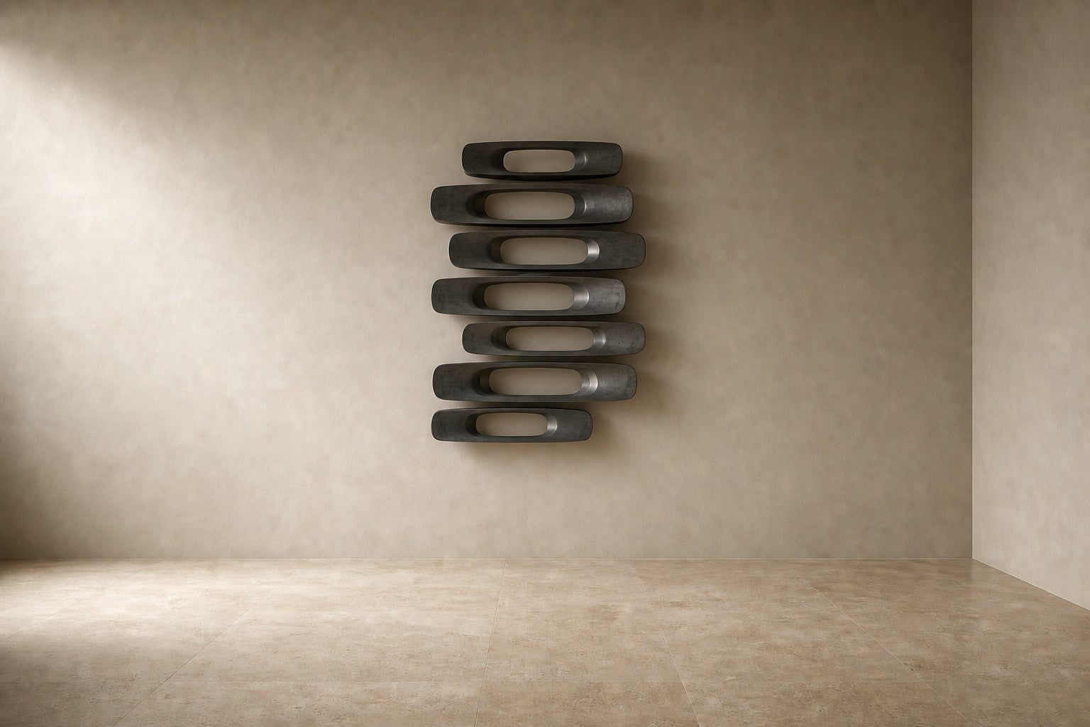 Gunmetal with bright edges bronze wall sculpture Scalino, graduated blades stepped across a concealed spine, on a plaster wall.
