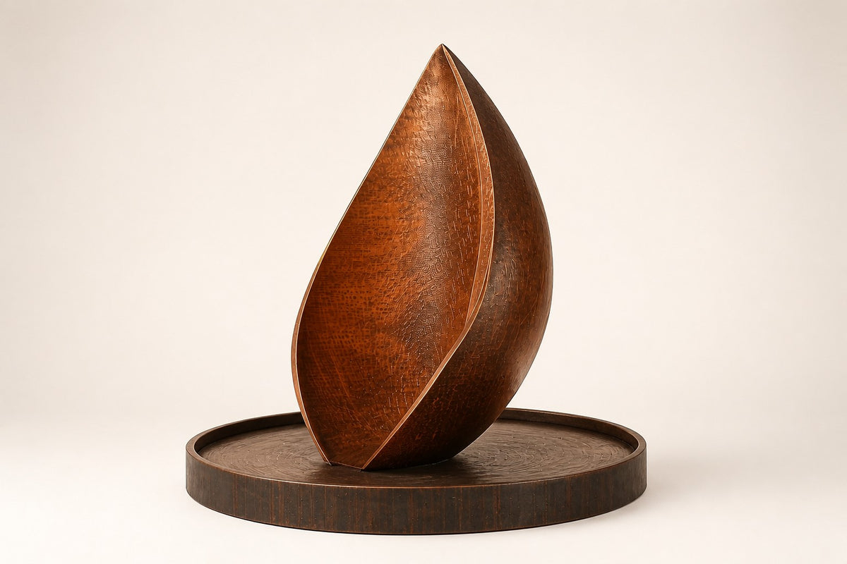 EMBER / RISE I — 200 cm leaf-shaped Corten steel water feature in a round stone basin, studio view of the whole piece