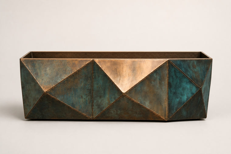 Facet Planter — 45 cm faceted trough planter with triangular copper and verdigris-patina panels, studio view of the whole piece