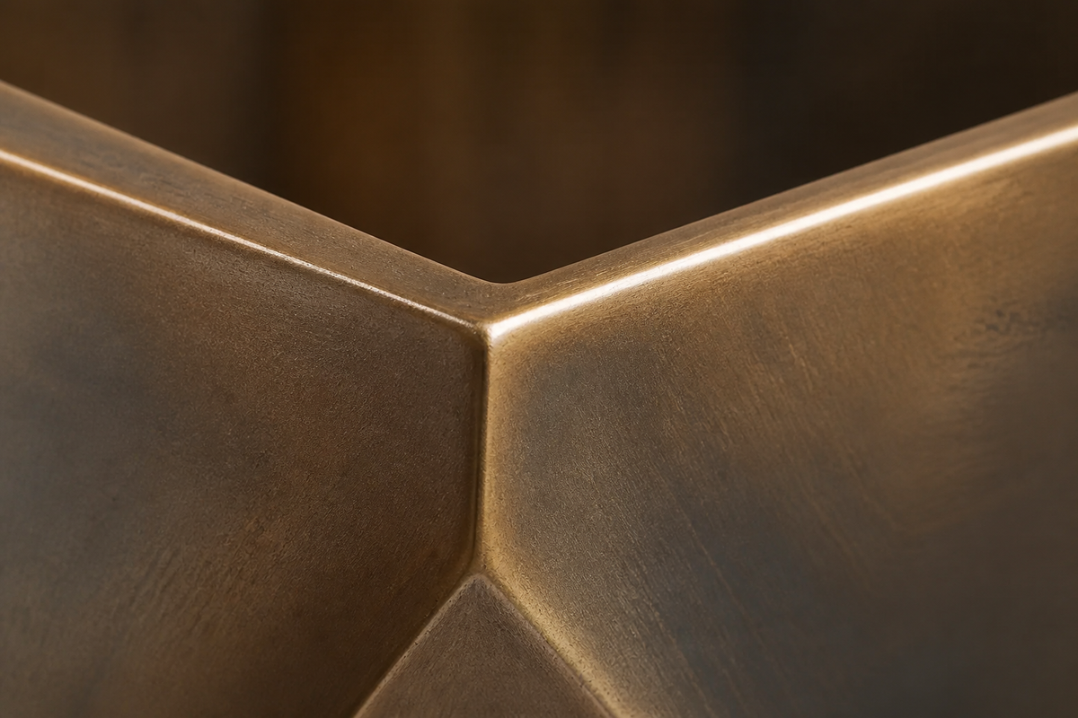 Faceted Bronze Geometric Luxury Planter sculpture, close studio detail of the surface and material