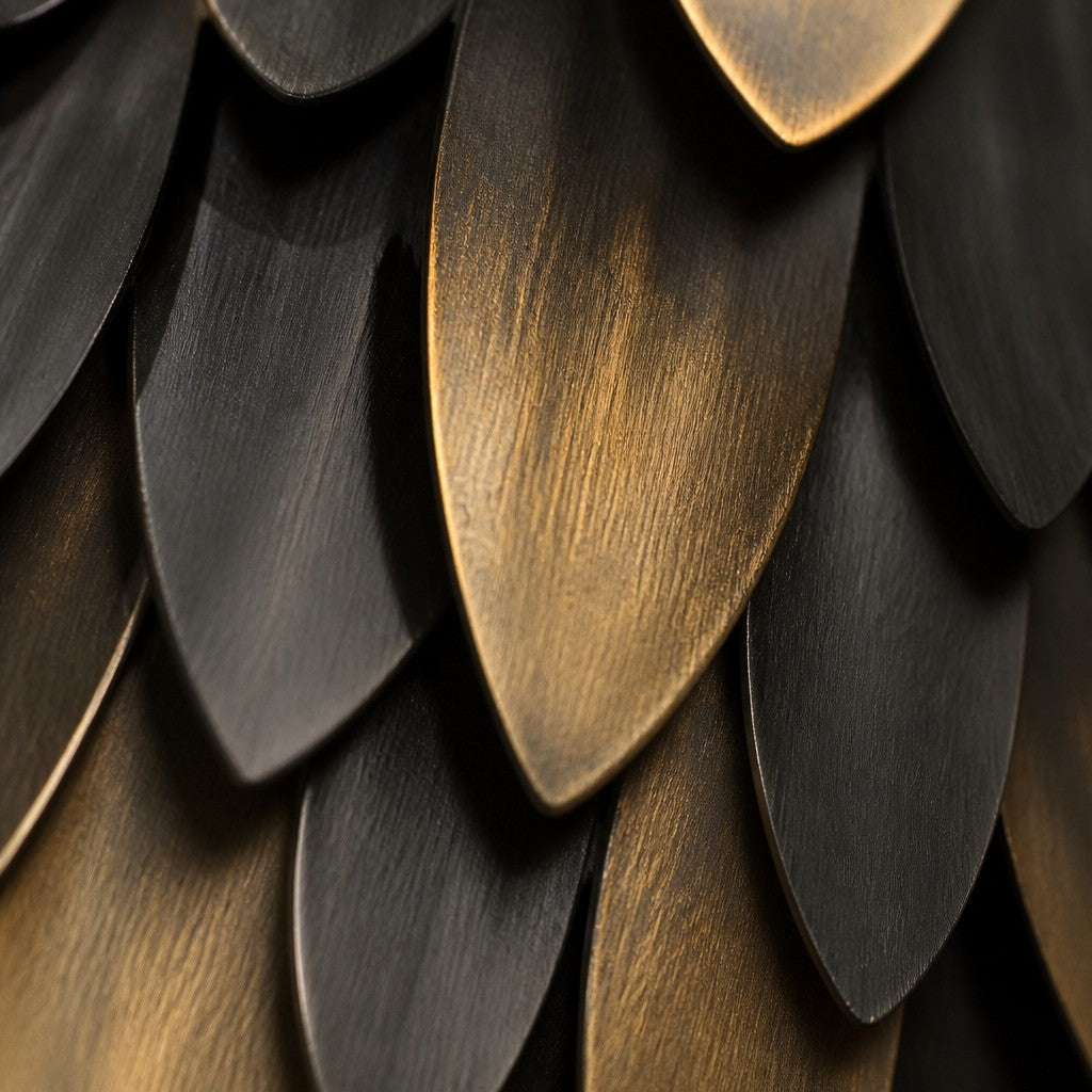 Antique bronze with dark rosettes bronze wall sculpture Fahd, cast relief head set within a spun disc, on a plaster wall.