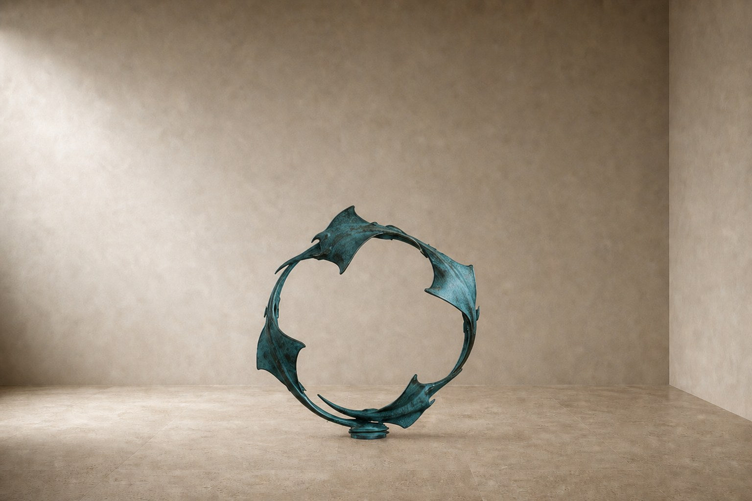 Blue-patinated bronze ring sculpture Farallon Ø60, four winged forms overlapping into a circle, on a black granite block.