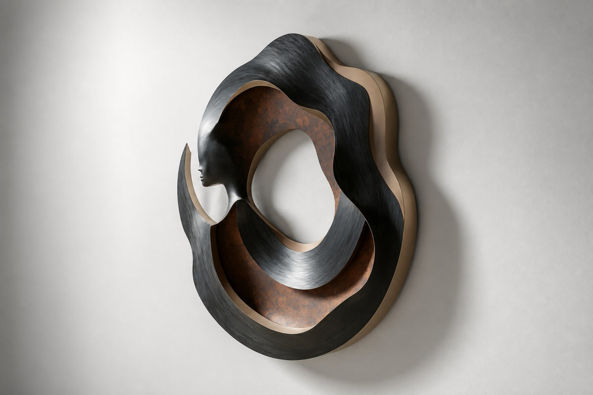 Figura — bronze and copper circular wall sculpture with a woman's profile, studio side angle showing its depth