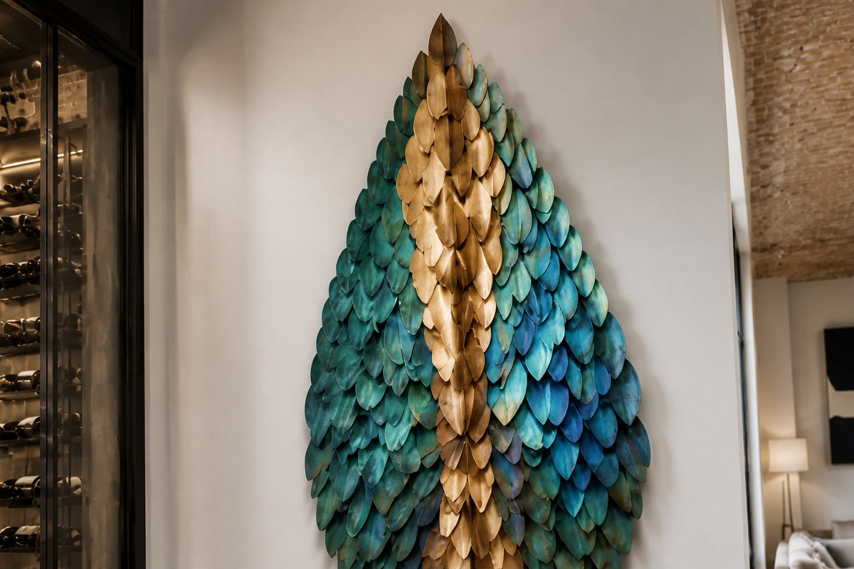 Firuz — 90 × 180 cm diamond-shaped wall sculpture of teal enamel and gold scales on a central spine, close view in the room