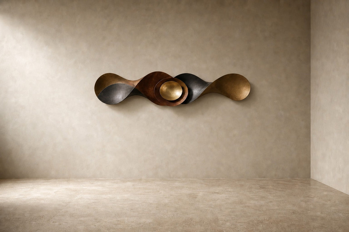 Flusso — 210 × 55 cm bronze wall sculpture of a twisting ribbon with a gold centre, studio view of the whole piece