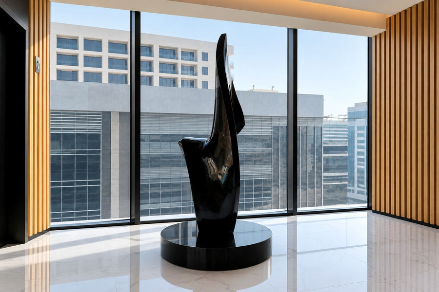 The Four, black marble sculptures