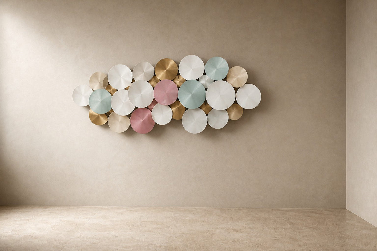 Ghimam — 200 × 80 cm wall cluster of spun discs in pastel pink, mint and gold, three-quarter studio view showing its profile
