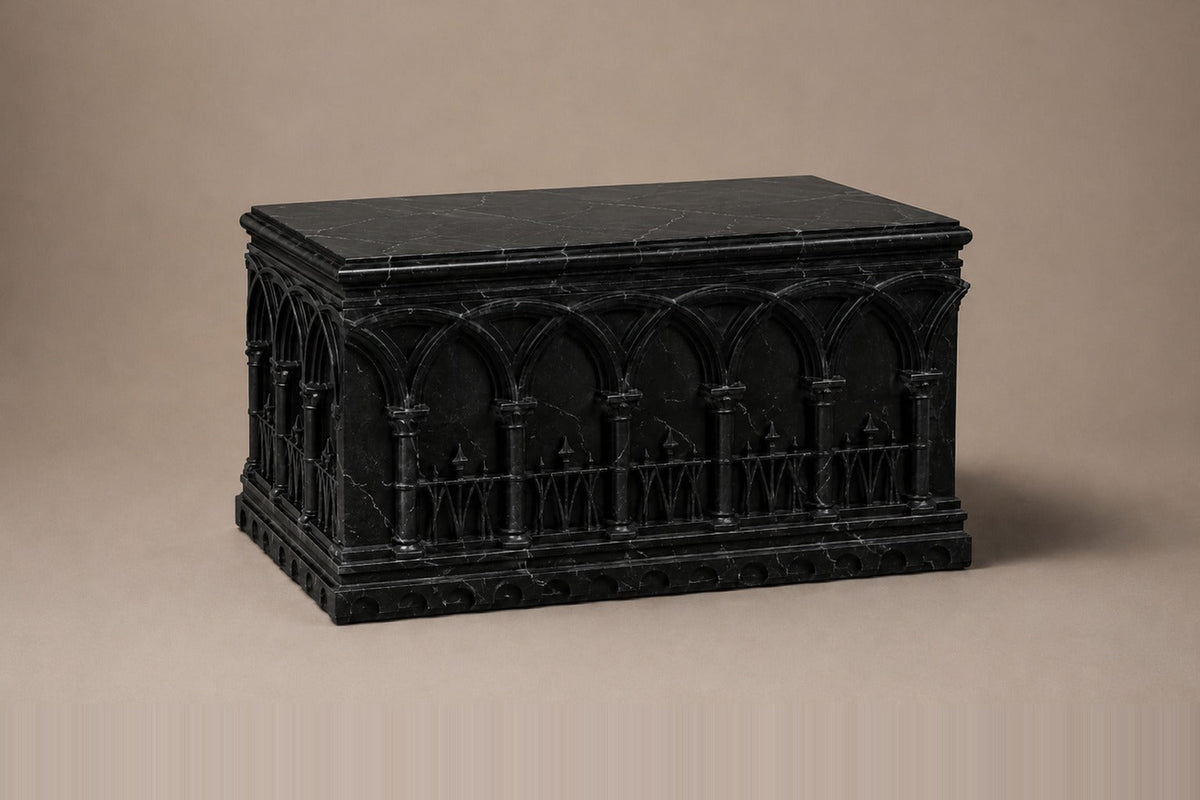 Low wide black Nero Marquina marble base carved with an arcade of pointed Gothic arches on colonnettes — three-quarter studio view of the whole pedestal