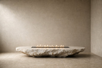 White quartzite fire table Himara 220, bright white with warm inclusions, on a pale stone floor.