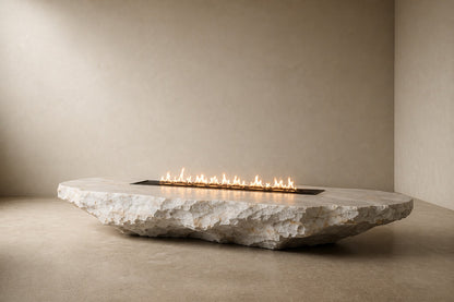 White quartzite fire table Himara 220, bright white with warm inclusions, on a pale stone floor.