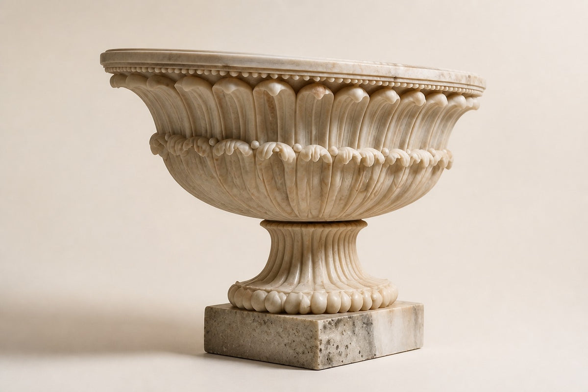 Imperial Petal Marble Urn Planter — 90 cm cream-white marble urn planter with a bowl of carved upturned petals, three-quarter studio view showing its profile