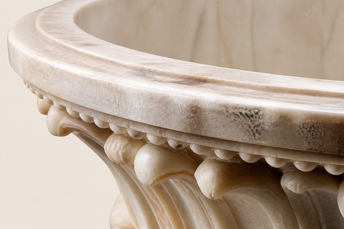 Imperial Petal Marble Urn Planter — 90 cm cream-white marble urn planter with a bowl of carved upturned petals, close studio detail of the surface and material