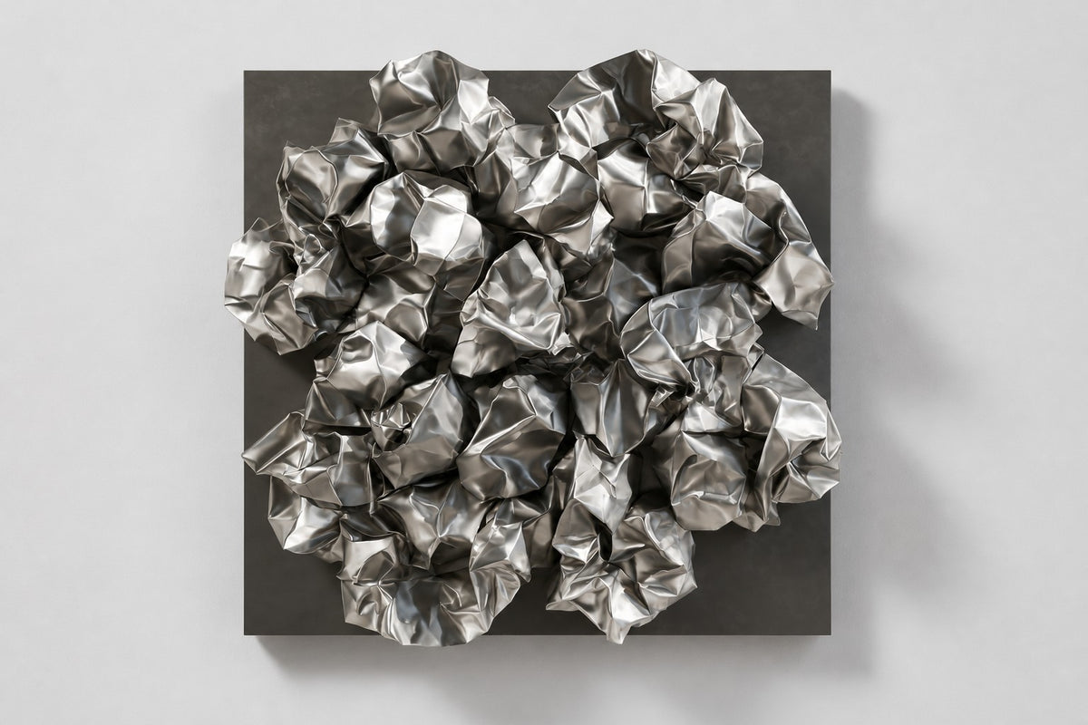 Kori — crumpled polished stainless steel square wall sculpture, studio front view