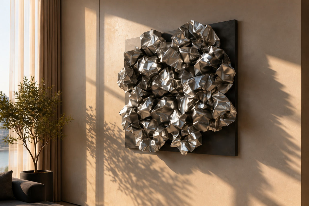 Kori — crumpled polished stainless steel square wall sculpture, close view on the wall
