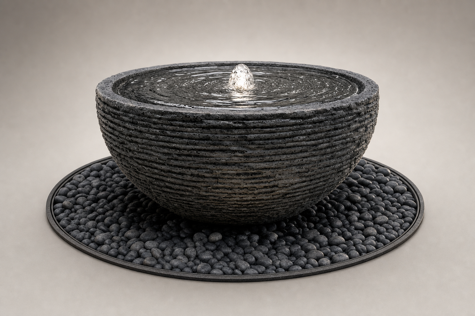 Lagoa charcoal stone bowl fountain by 1-OPH, ribbed hemispherical basin