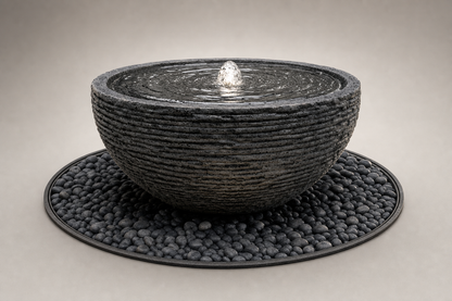 Lagoa charcoal stone bowl fountain by 1-OPH, ribbed hemispherical basin