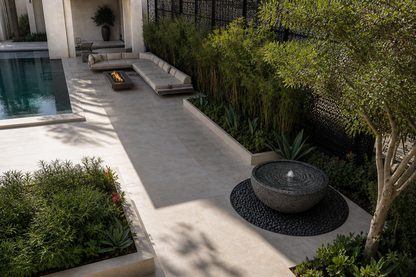 Lagoa charcoal stone bowl fountain by 1-OPH seen from above in pebbles