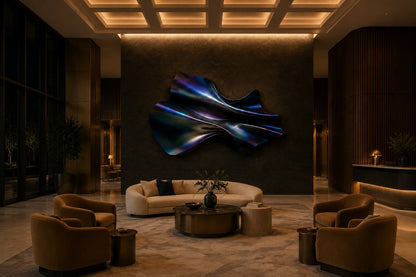Iridescent blue and violet steel wall sculpture Lazward, overlapping scales layered on a shaped armature, on a plaster wall.