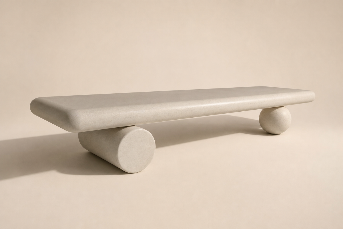 Lenire stone sculptural bench, three-quarter studio view showing its profile