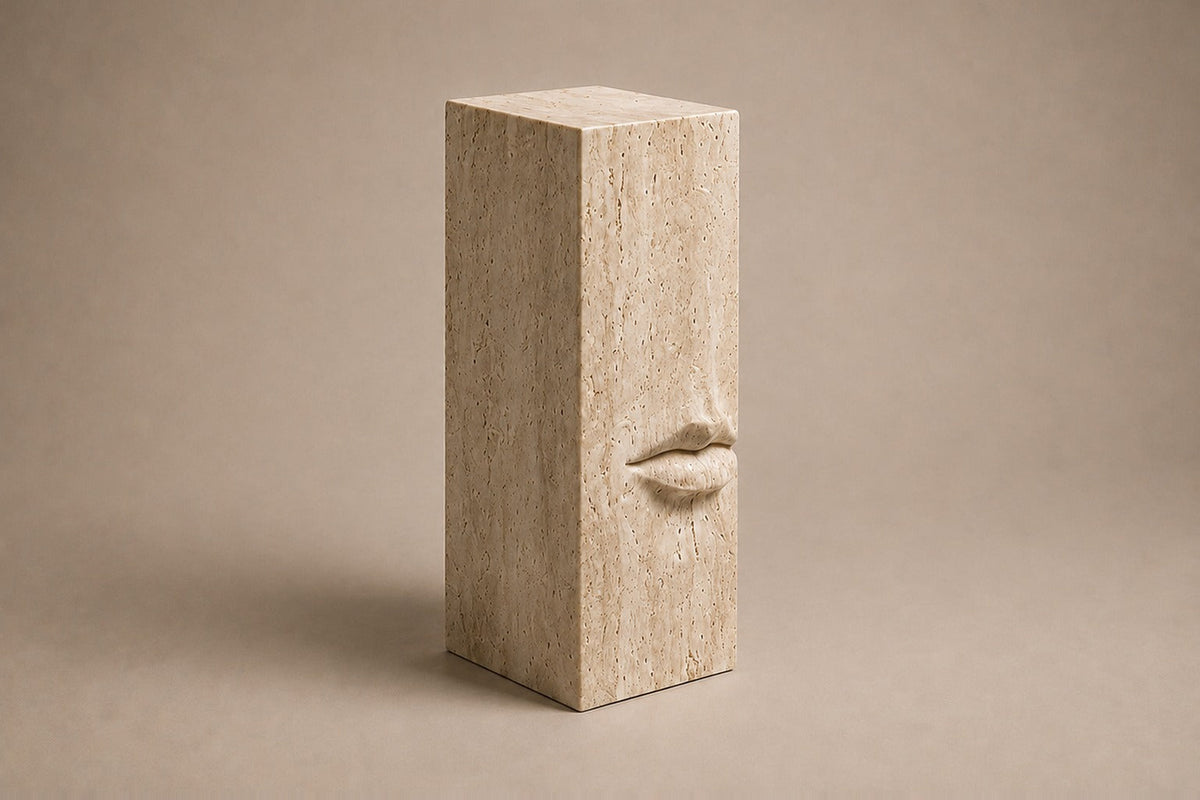 Tall cream travertine pedestal with a mouth carved in relief on one face — three-quarter studio view of the whole pedestal