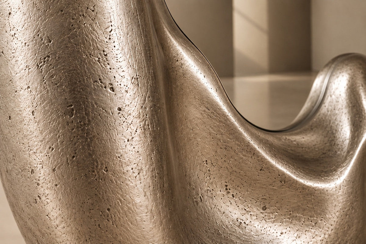 Lucidez — 110 × 200 cm tall standing mirror with a brushed stainless steel frame melting at the base, close studio detail of the surface and material