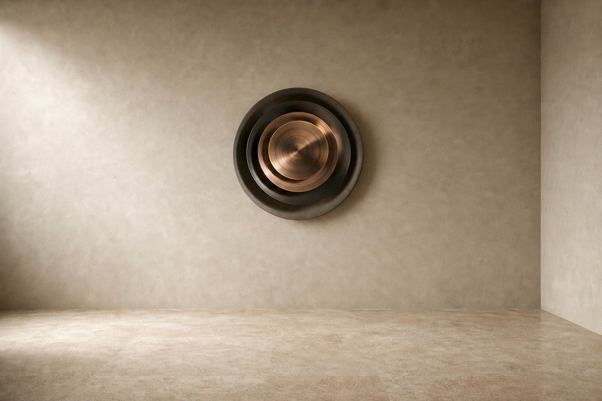 Madar — 110 × 110 cm round bronze wall sculpture of nested spun rings, studio view of the whole piece