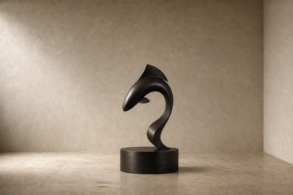 Dark patinated bronze sculpture Manglar, a form curved into a deep S rising from an integral bronze drum base.