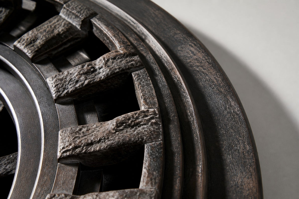 Menhir — Ø 200 cm dark patinated bronze circular wall relief of a stone circle, close detail of the surface and edge