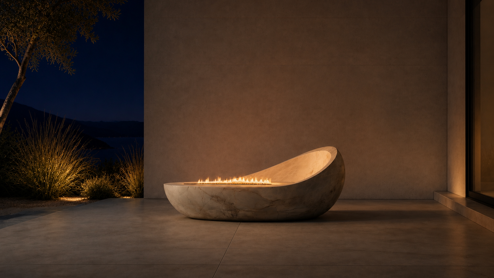 Nevara white marble fireplace by 1-OPH lit at night
