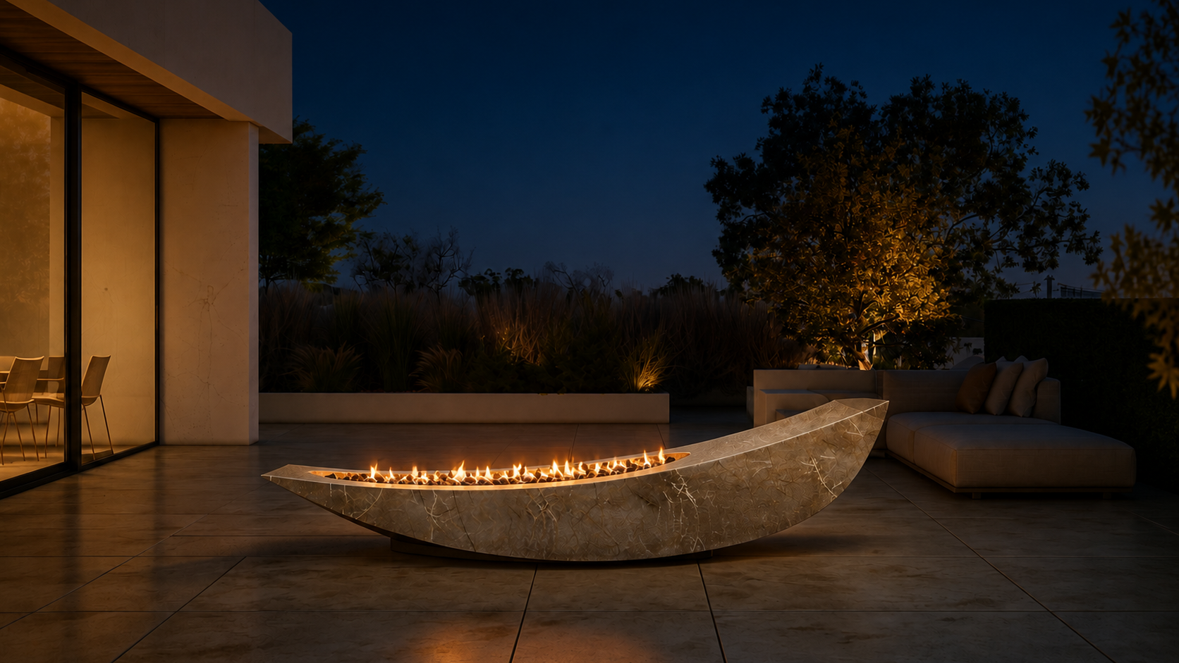 Velara champagne marble fireplace by 1-OPH lit at night