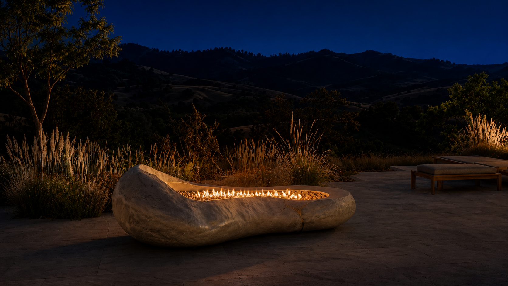 Lunara white stone fireplace by 1-OPH lit at night
