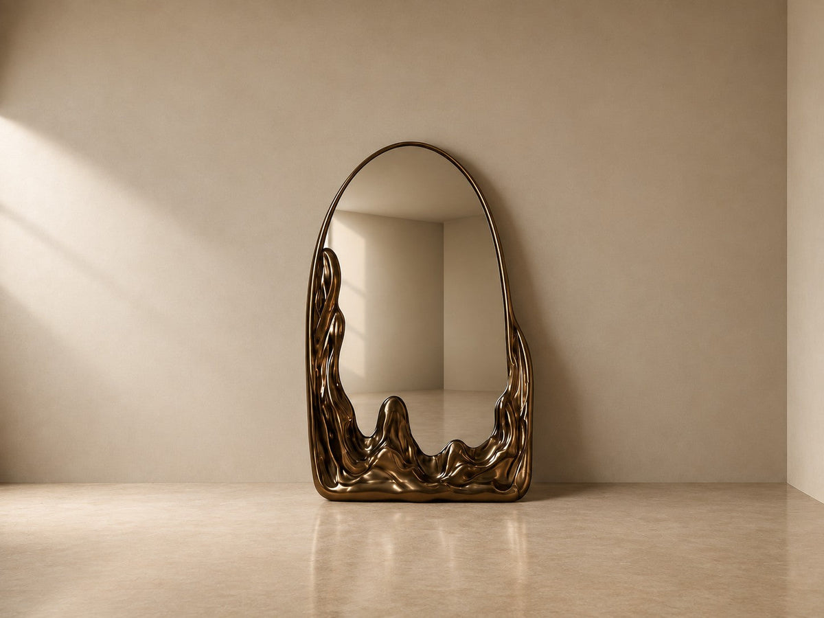 Miraggio — 110 × 200 cm tall arched standing mirror with a dark bronze frame melting at the base, studio view of the whole piece