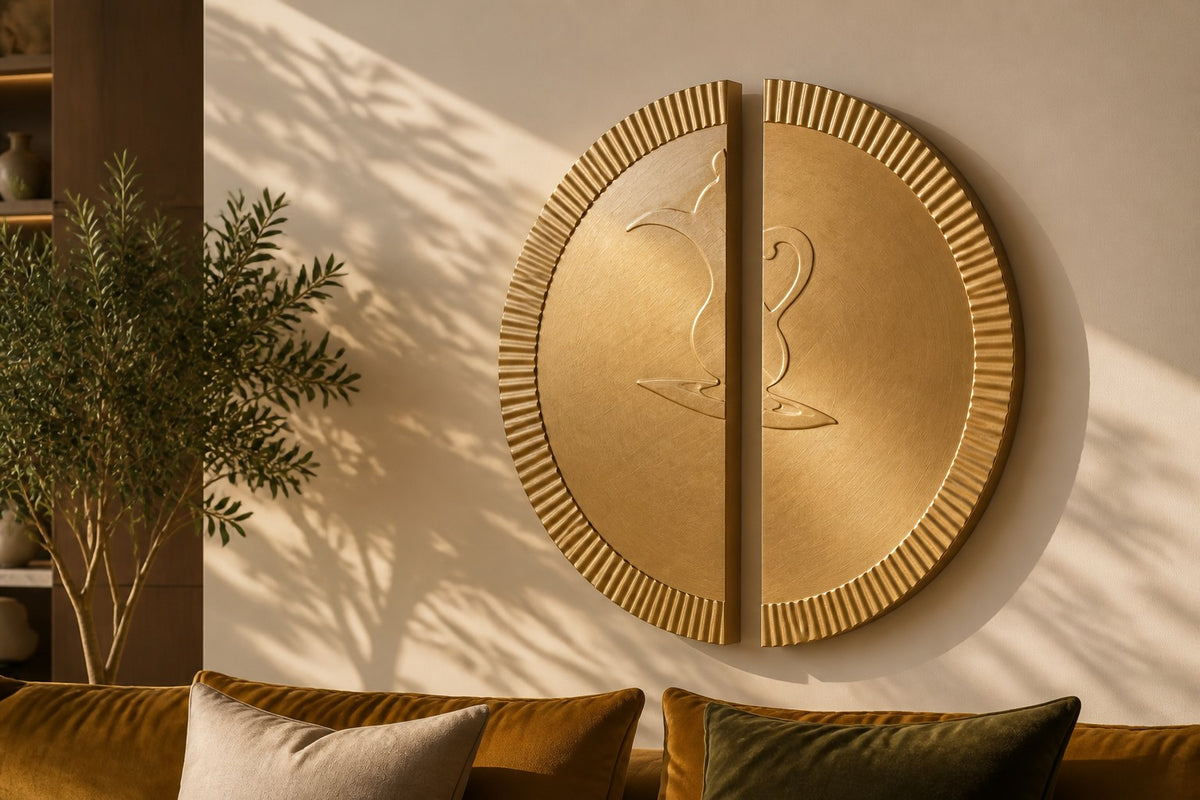 Mitad — Ø 200 cm brushed brass circular wall relief split into two offset fluted halves, close view in the room