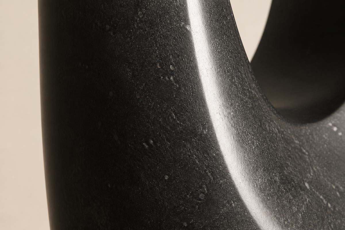 MONOLITH VOID I stone sculpture, close studio detail of the surface and material