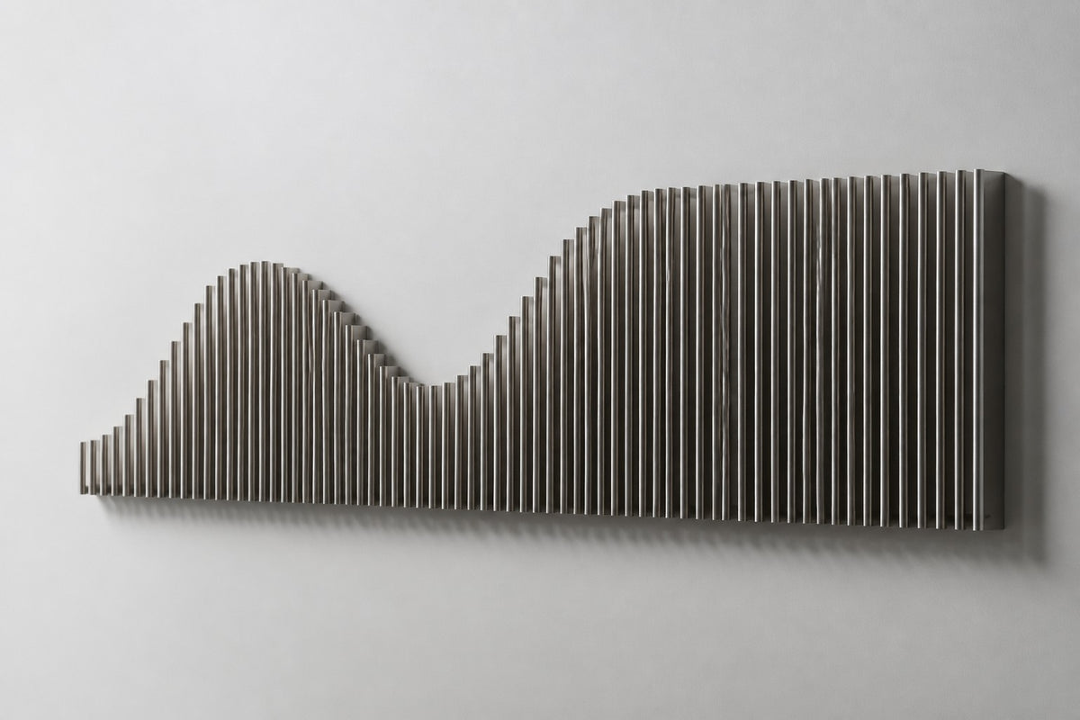 Nagare — stainless steel rod skyline wall sculpture, studio side angle showing its depth