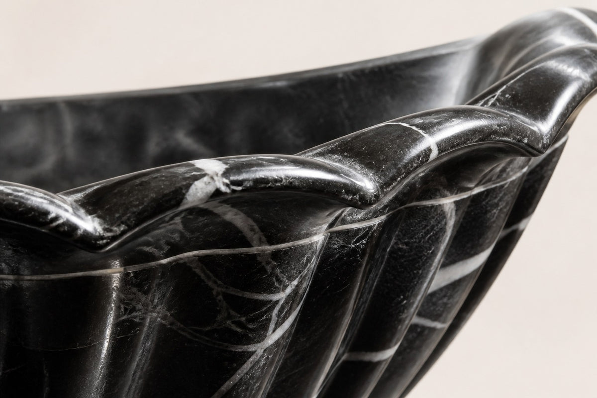 Nero Fluted Marble Urn Planter — 85 cm Nero Marquina black marble urn planter with a fluted scalloped bowl, close studio detail of the surface and material