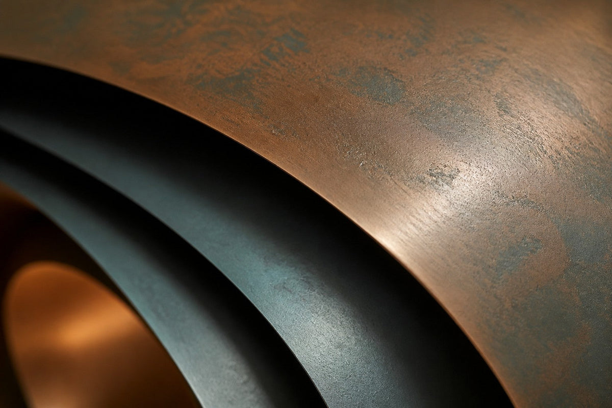 Nur — 130 × 85 cm dark bronze wall sculpture of a layered shell with a polished core, close studio detail of the surface and material