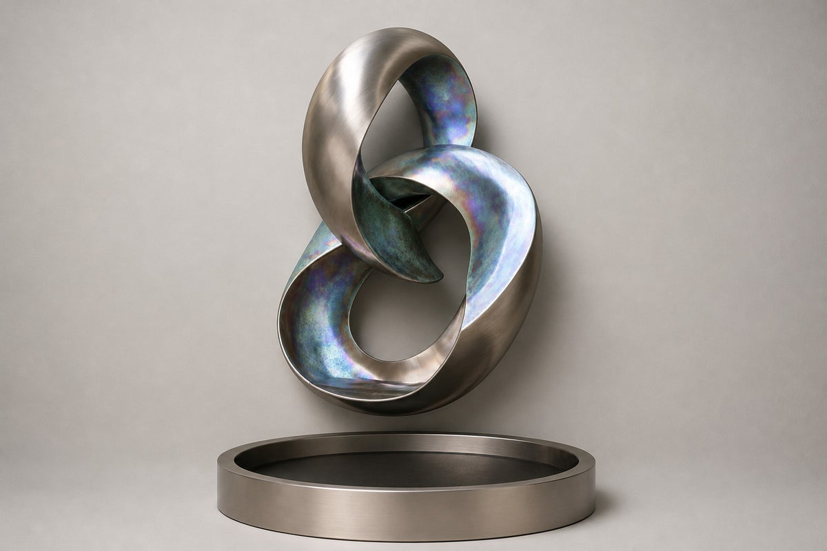 Orin — iridescent ribbon wall fountain, studio front view
