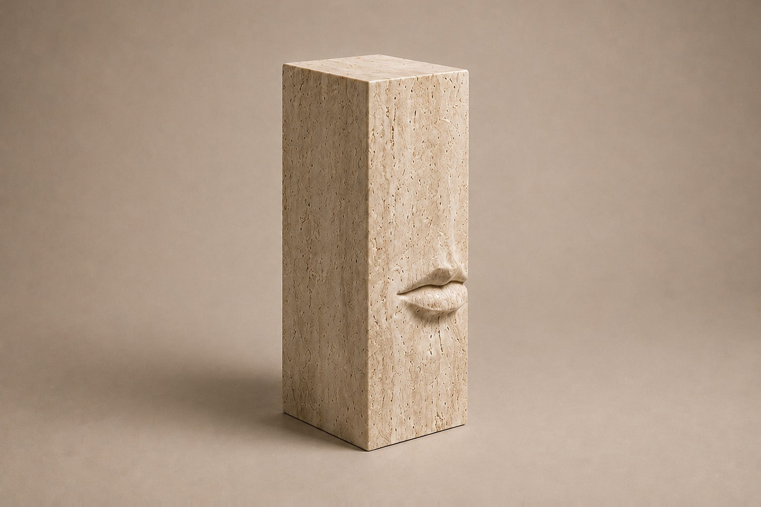 Tall cream travertine pedestal with a mouth carved in relief on one face.