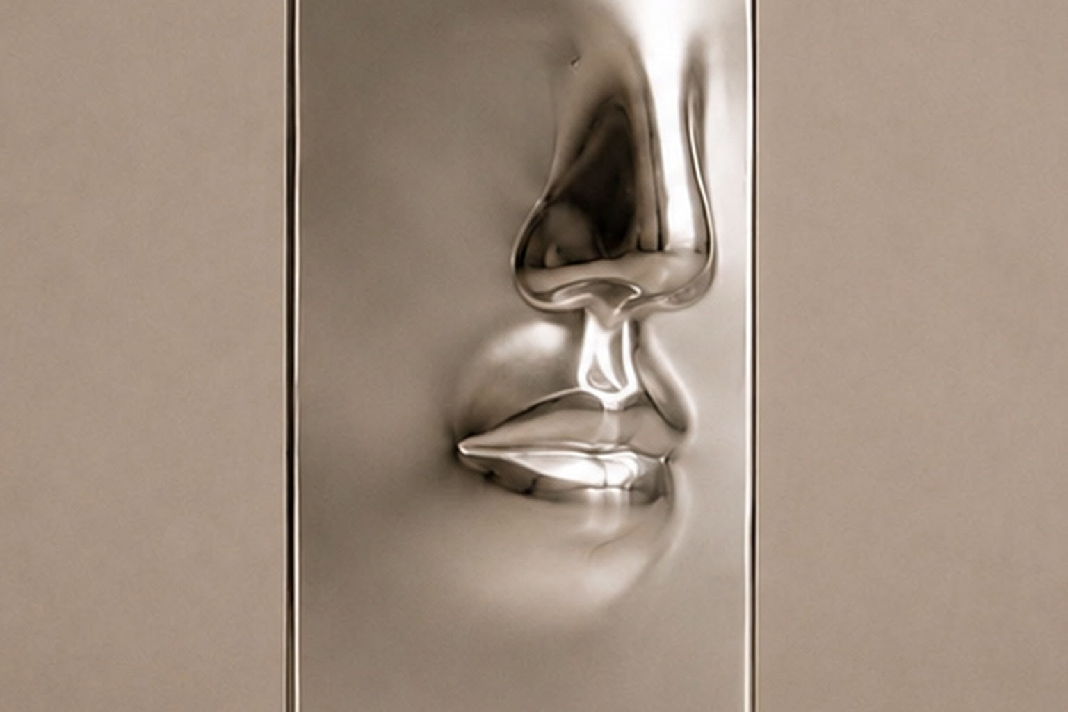 Tall mirror-polished stainless steel pedestal with a nose and mouth formed seamlessly out of one face.