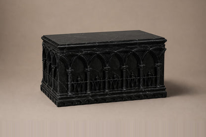 Low wide black Nero Marquina marble base carved with an arcade of pointed Gothic arches on colonnettes.