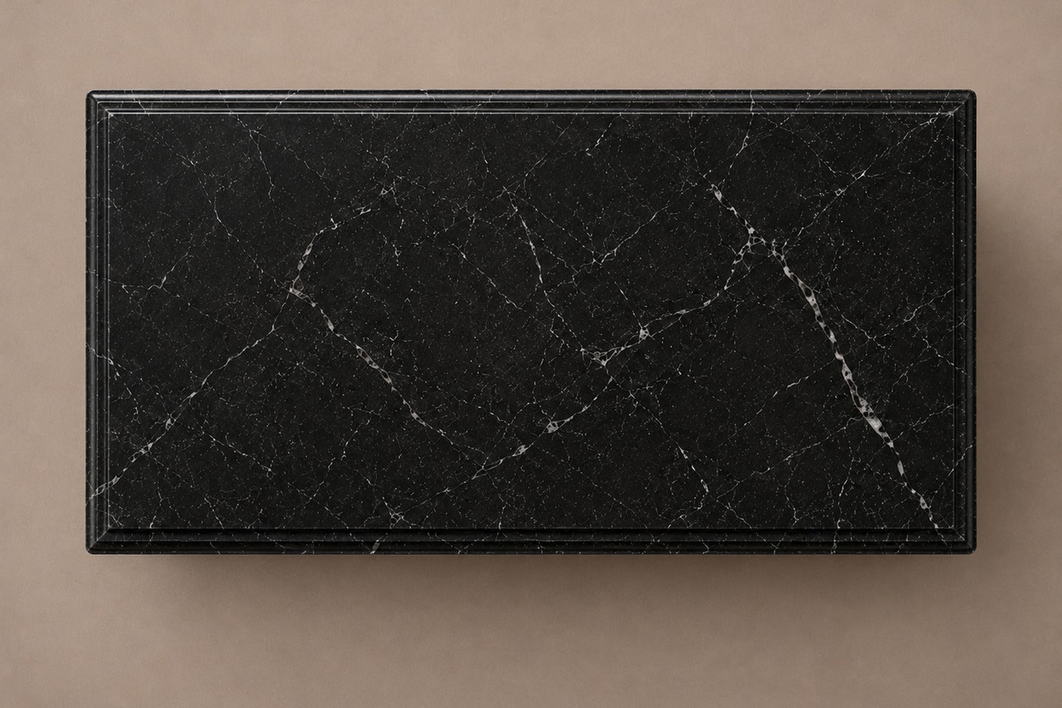 Low wide black Nero Marquina marble base carved with an arcade of pointed Gothic arches on colonnettes.